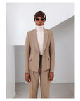 The “Anita” Suit A Tortilla brown, peak lapel, double breasted jacket & straight pant