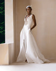 An Ivory White Satin Ball Dress With Swarovski embellished V-Neckline