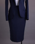 A Navy Blue, dotted pattern, nobility wool blend, business wide notch lapel suit & skirt pant.